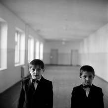 Two boys stood in the deserted corridors of School No. 6 as term restarted in Beslan, North Ossetia, September 2004